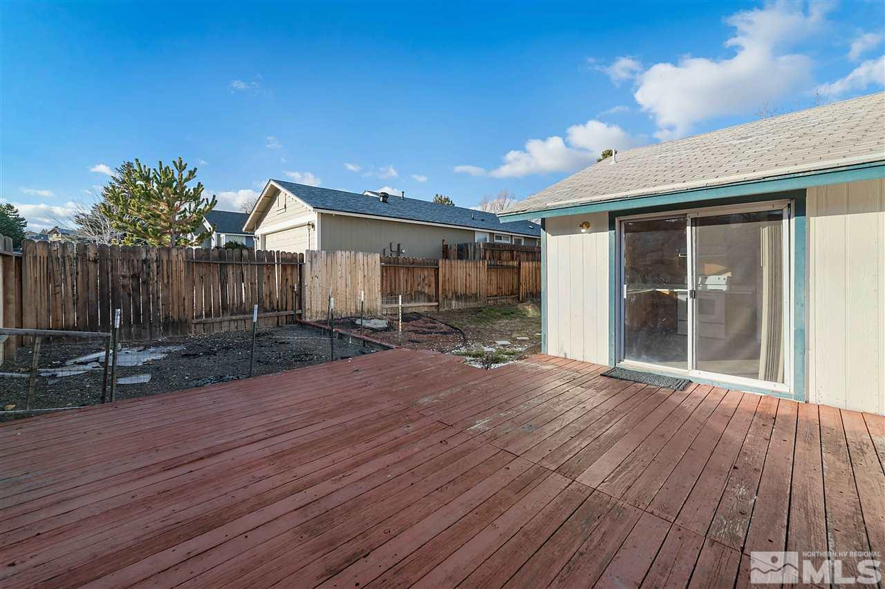 6314 Moon Ridge Terrace Reno, NV 89523 - Photo 20 of 24 a view of a house with backyard and porch