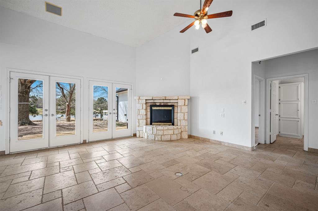 5327 Dusty Road Athens, TX 75752 - Photo 11 of 35 a view of empty room with cabinet and a fireplace