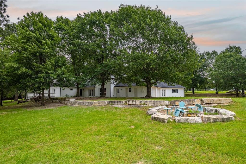 5327 Dusty Road Athens, TX 75752 - Photo 8 of 35 a swimming pool with outdoor seating and yard