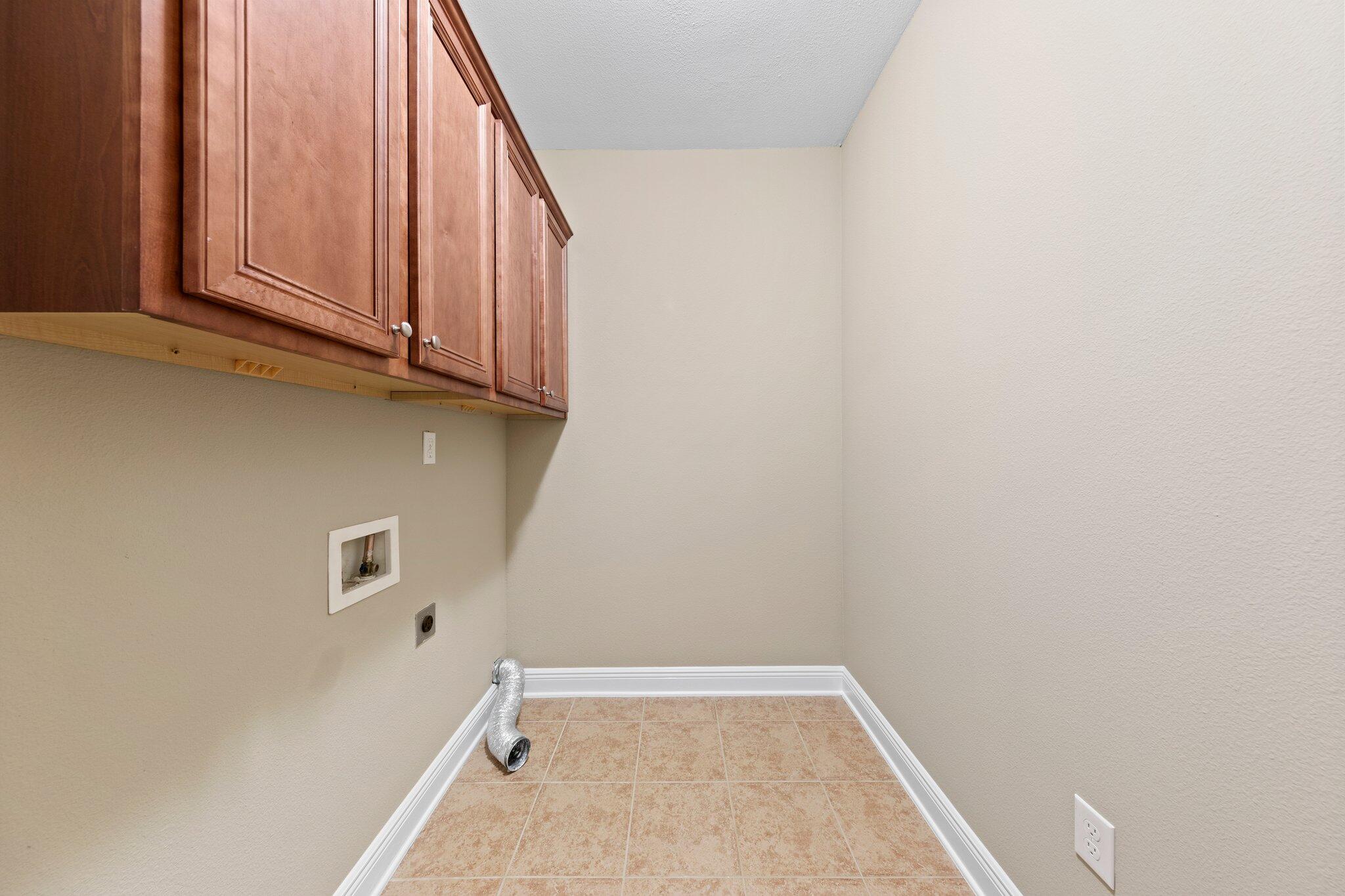 613 Red Fern Road Crestview, FL 32536 - Photo 11 of 39 a view of a storage and utility room with window