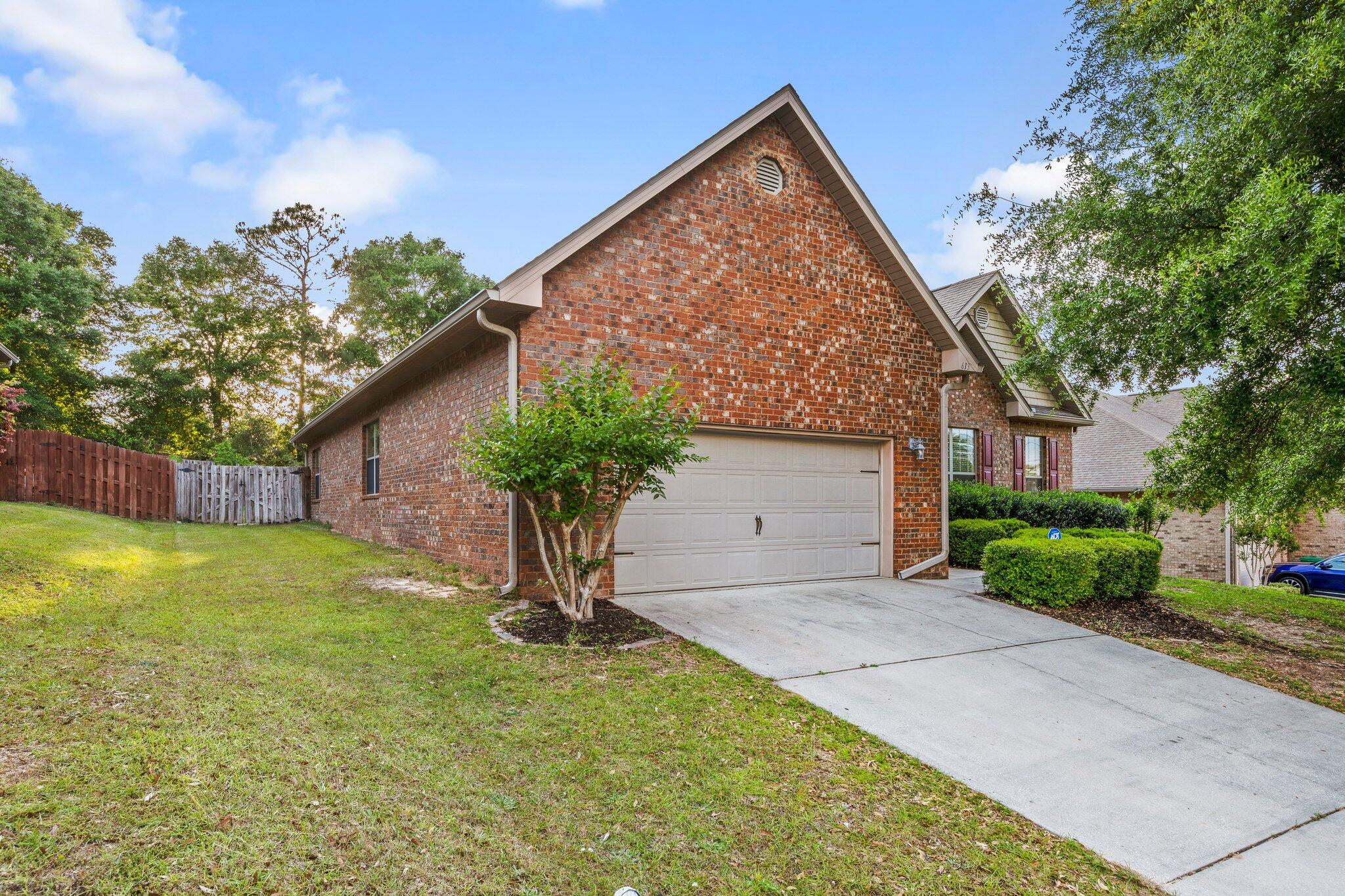613 Red Fern Road Crestview, FL 32536 - Photo 2 of 39 a view of backyard of house