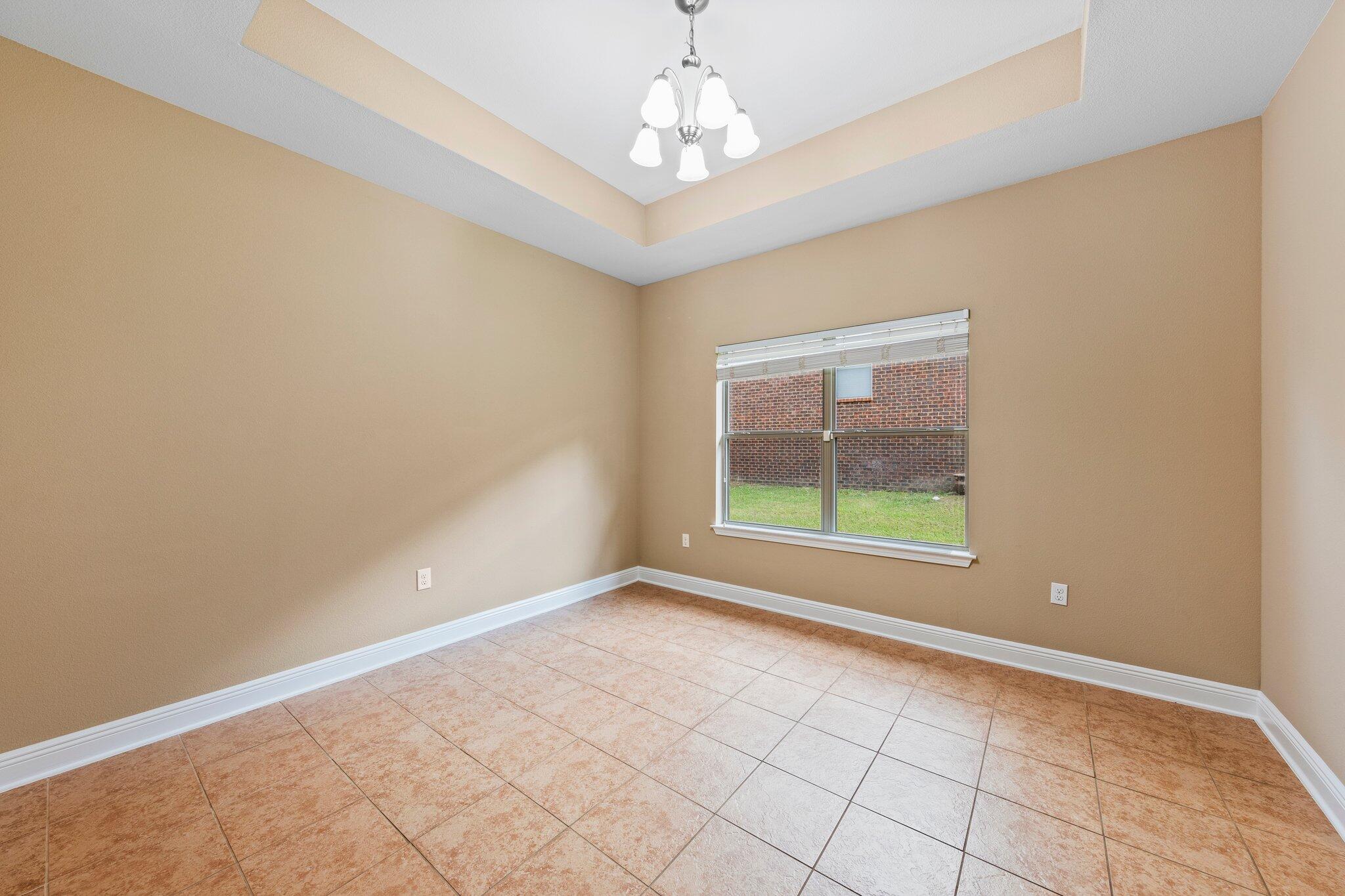 613 Red Fern Road Crestview, FL 32536 - Photo 22 of 39 a view of an empty room with a window