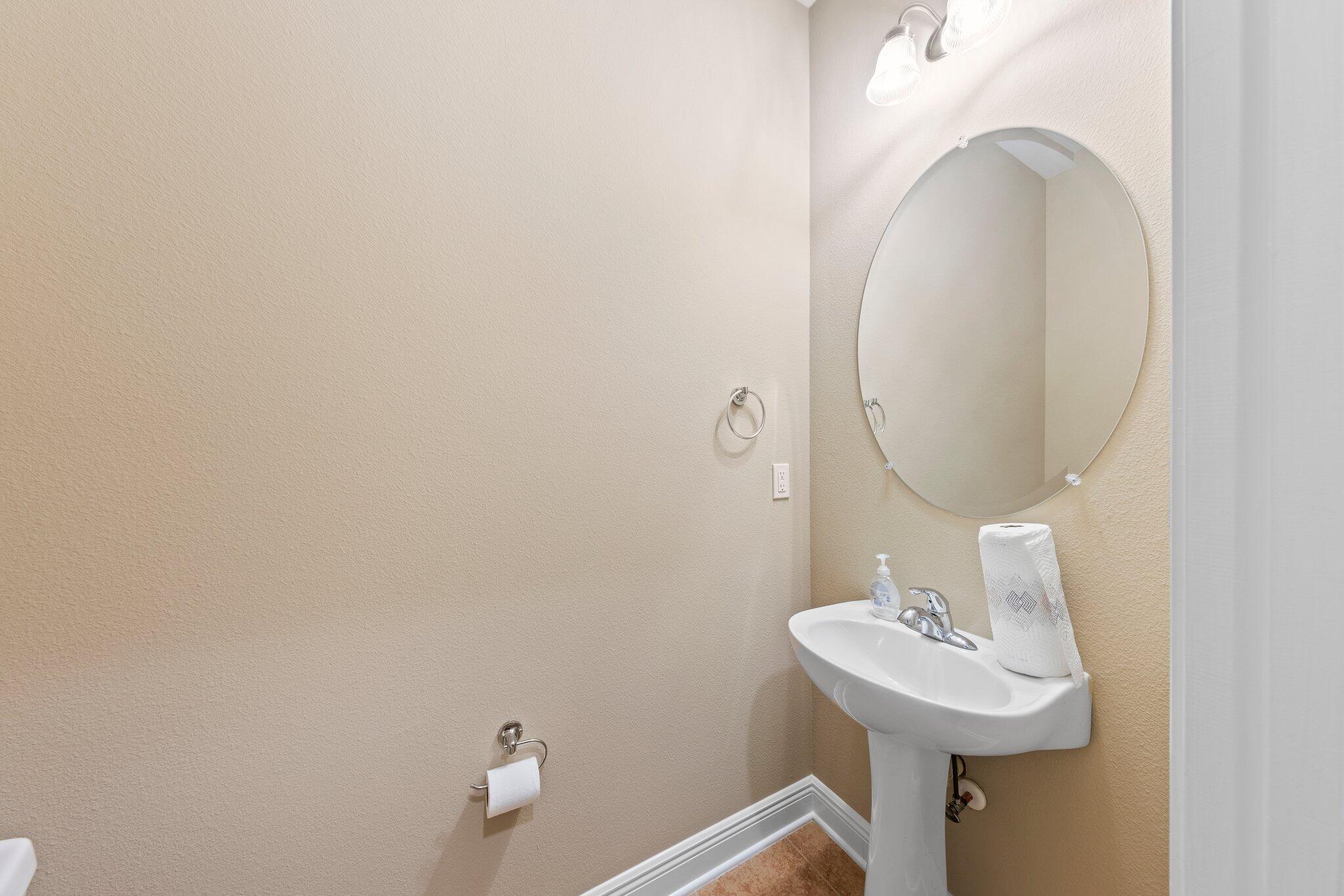 613 Red Fern Road Crestview, FL 32536 - Photo 24 of 39 a bathroom with a sink and a mirror