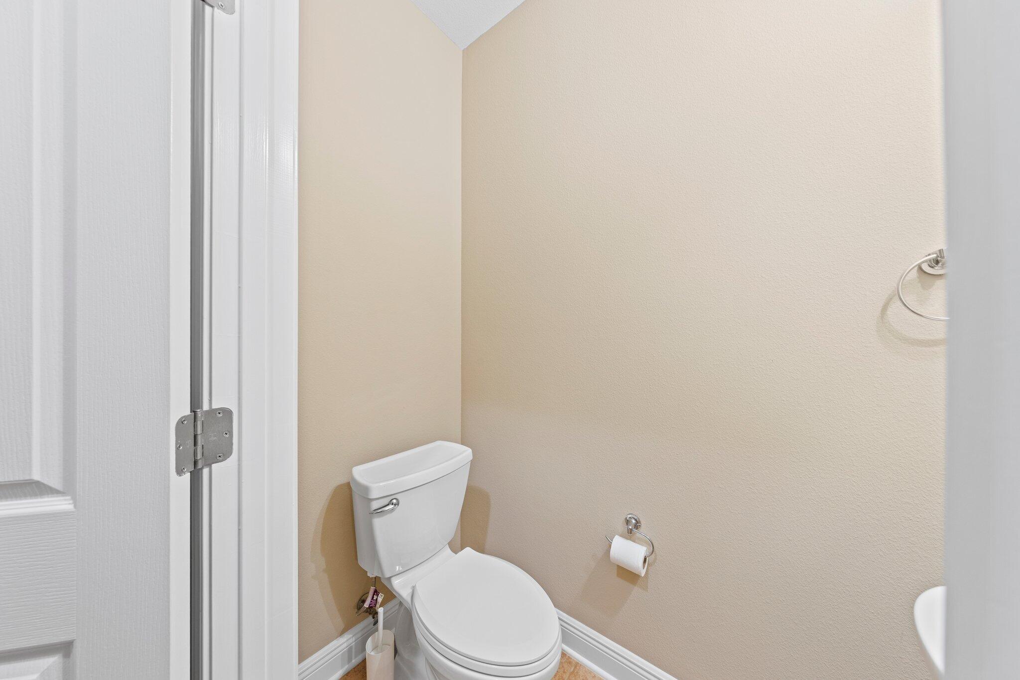 613 Red Fern Road Crestview, FL 32536 - Photo 25 of 39 a white toilet sitting next to a shower