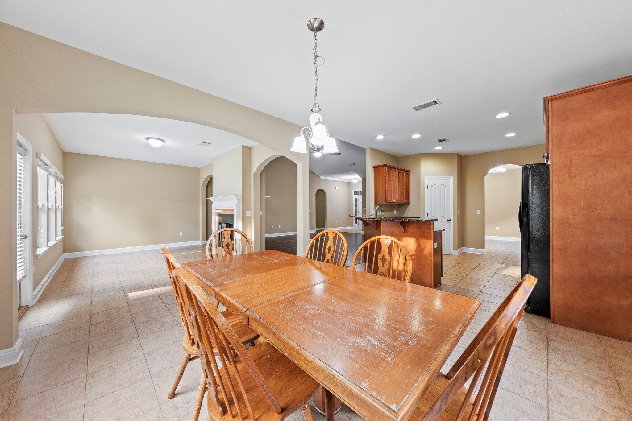 613 Red Fern Road Crestview, FL 32536 - Photo 32 of 39 a dining room with furniture and window