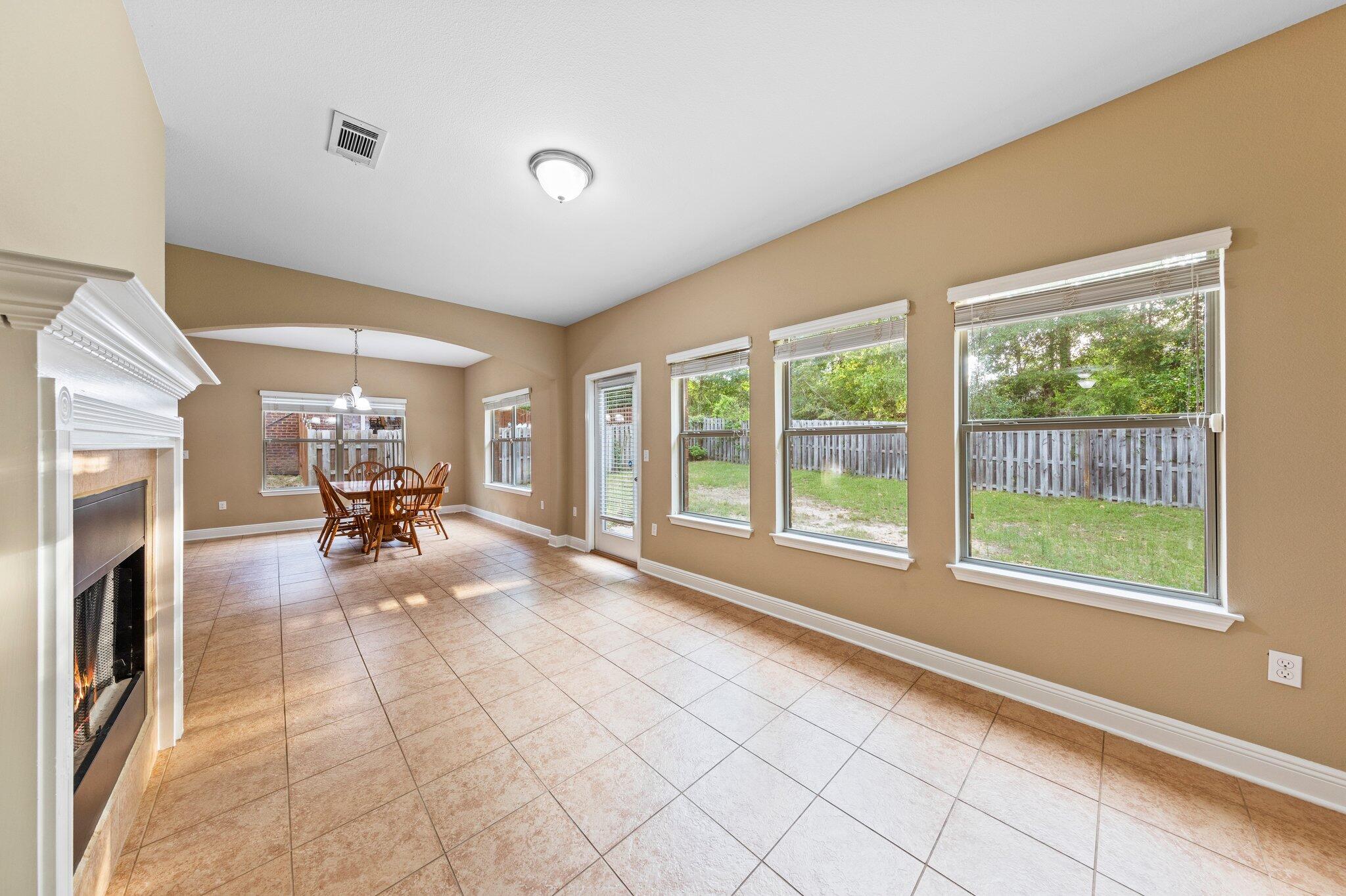 613 Red Fern Road Crestview, FL 32536 - Photo 34 of 39 a view of livingroom with furniture hardwood floor and a large window