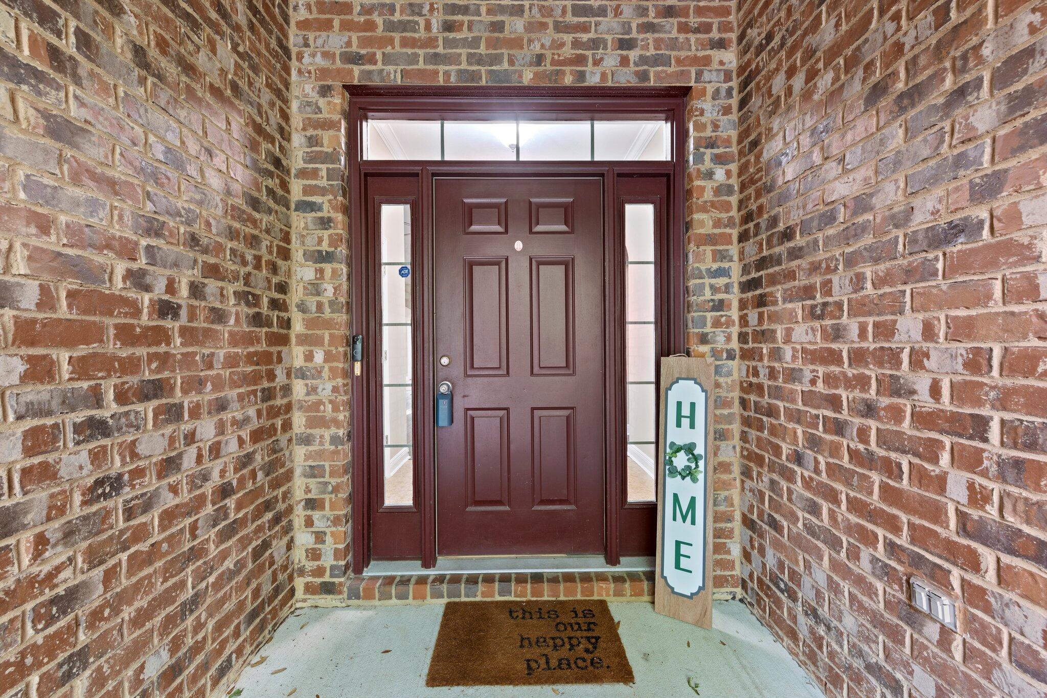 613 Red Fern Road Crestview, FL 32536 - Photo 39 of 39 a view of a brick house with a door
