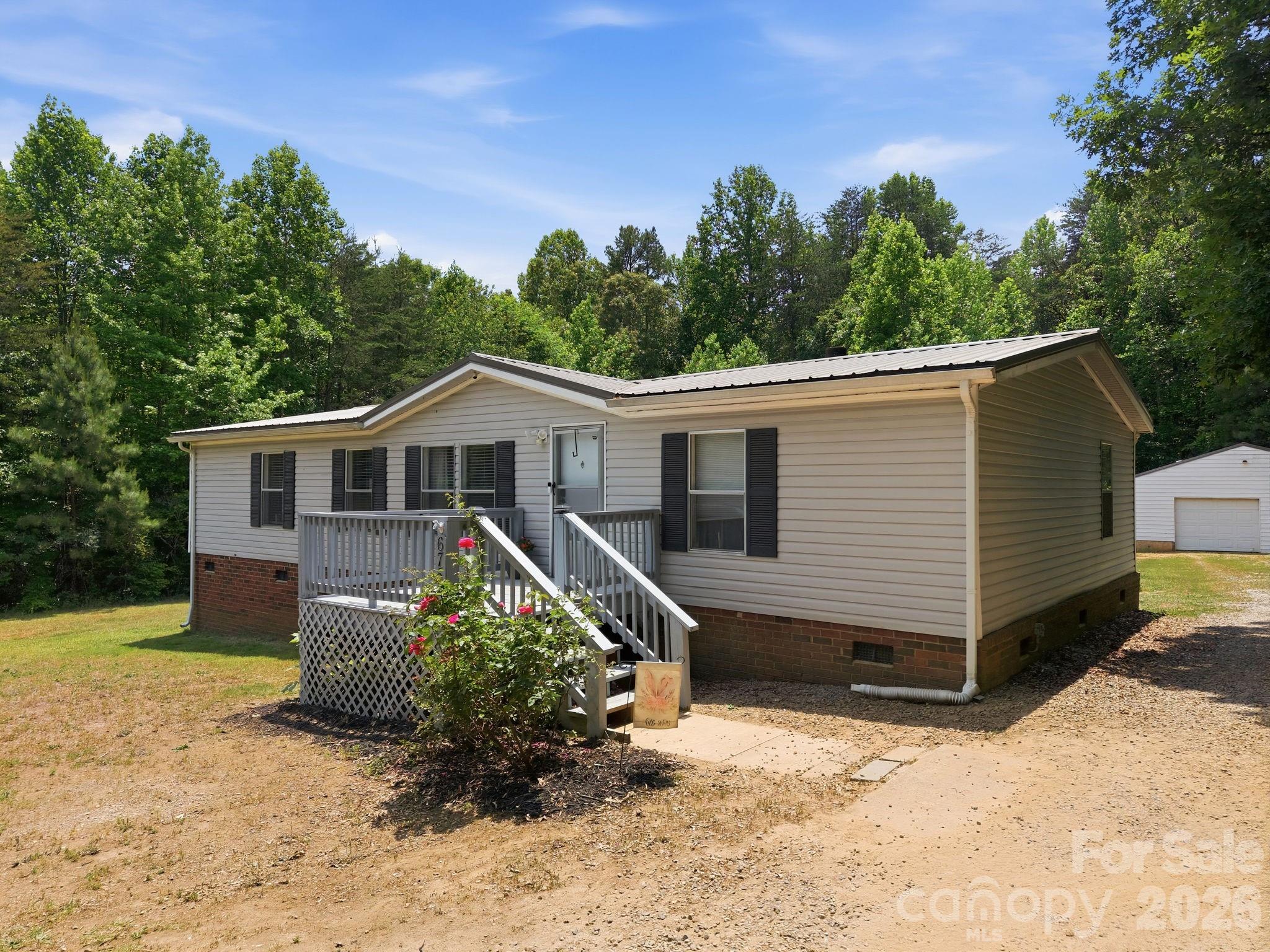 675 Overcash Road Salisbury, NC 28147 - Photo 8 of 48 a view of a house with a yard