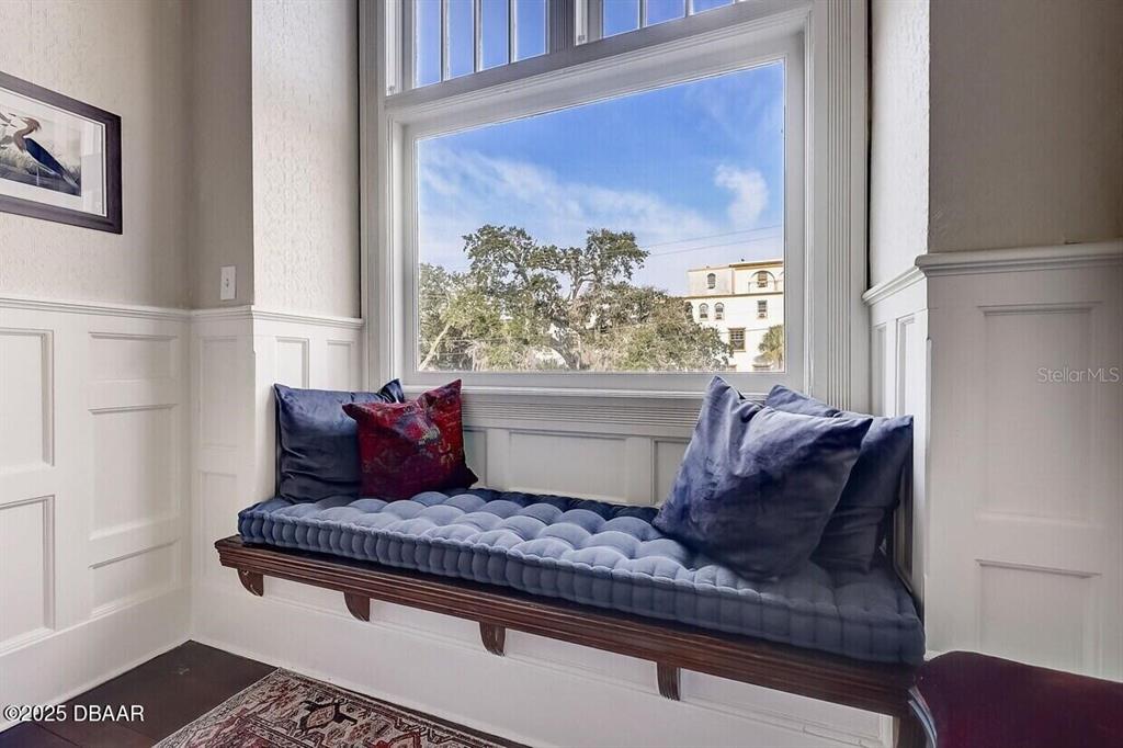 404 South Ridgewood Avenue Daytona Beach, FL 32114 - Photo 11 of 53 a living room with furniture and a large window