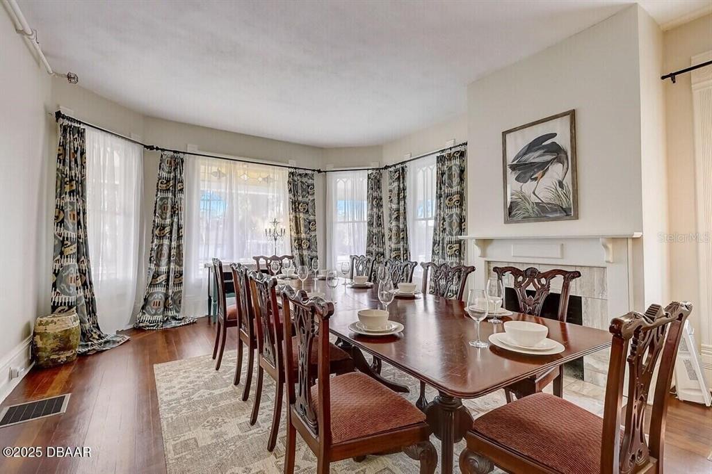 404 South Ridgewood Avenue Daytona Beach, FL 32114 - Photo 16 of 53 a view of a dining room with furniture window and outside view