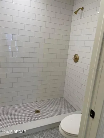 a bathroom with a sink vanity and a mirror