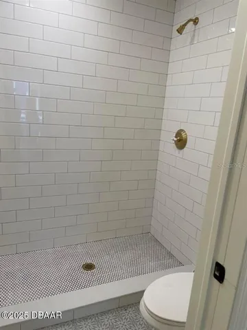 a bathroom with a sink vanity and a mirror