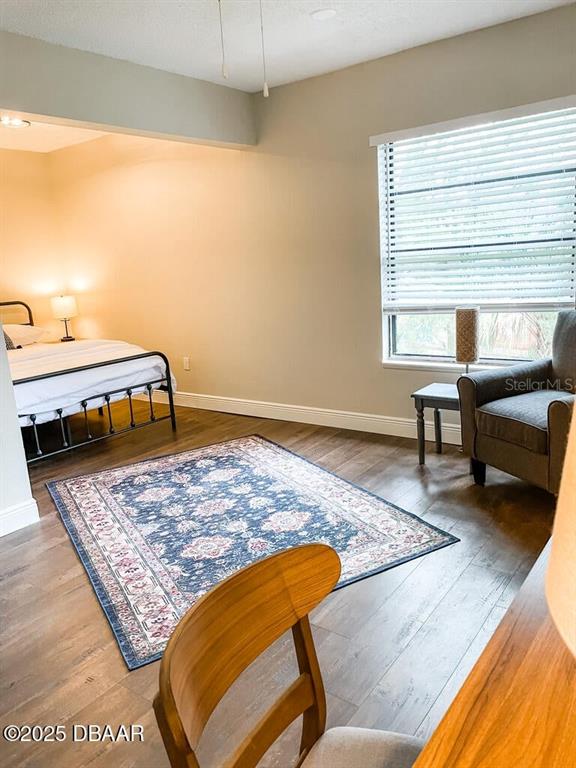 404 South Ridgewood Avenue Daytona Beach, FL 32114 - Photo 27 of 53 a living room with a couch and a coffee table