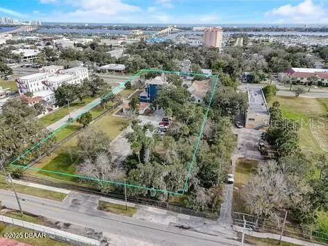 an aerial view of residential building and green space