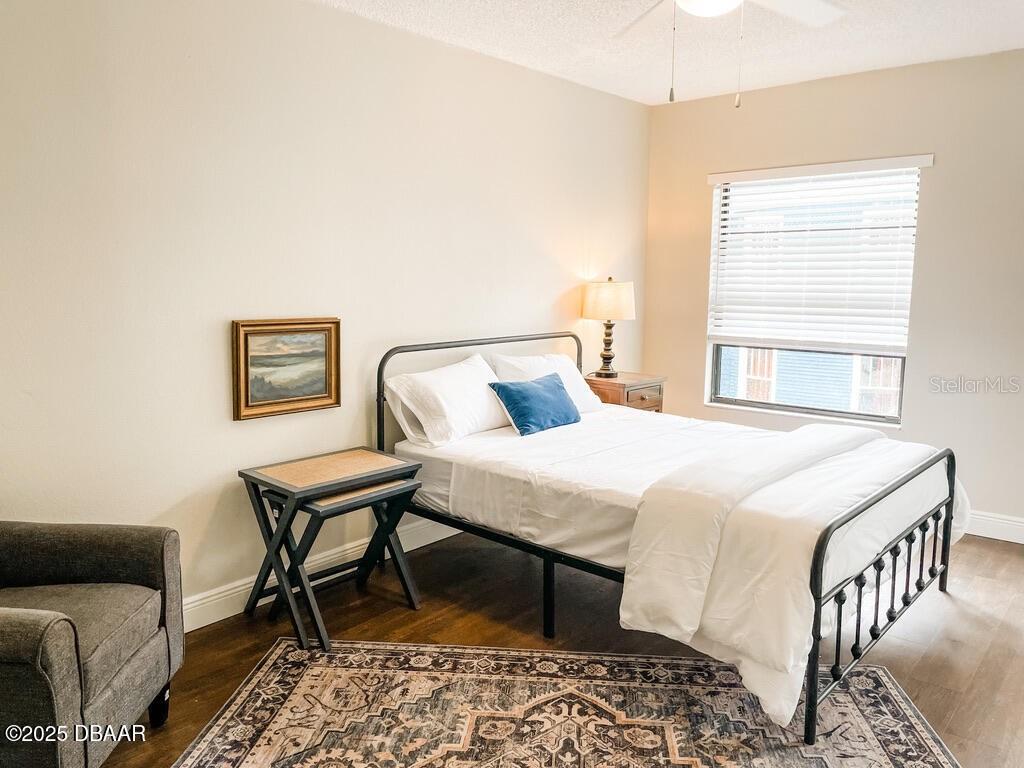 404 South Ridgewood Avenue Daytona Beach, FL 32114 - Photo 47 of 53 a bedroom with a bed and a window