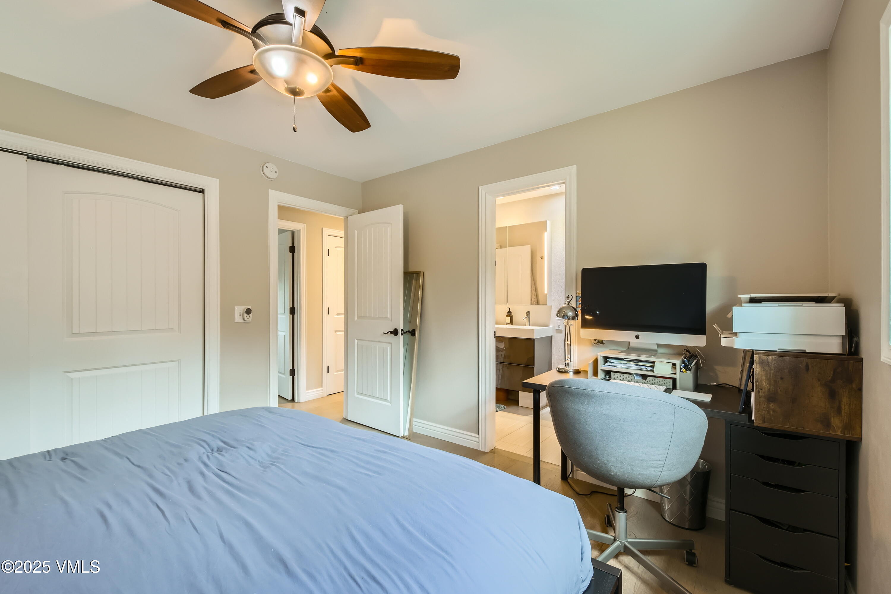 11 Spruce Circle Edwards, CO 81632 - Photo 13 of 27 a bedroom with furniture a bed and a flat screen tv