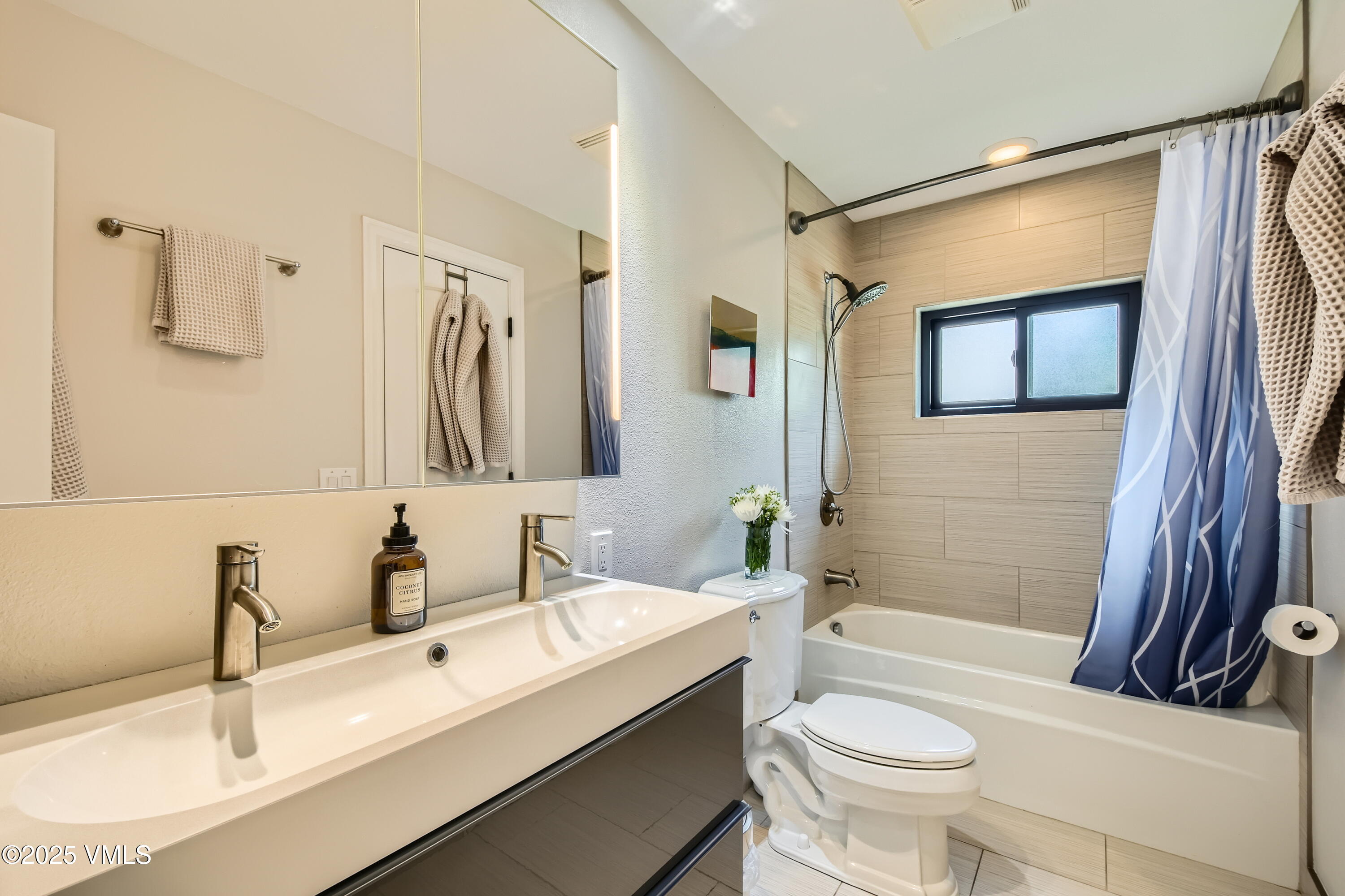 11 Spruce Circle Edwards, CO 81632 - Photo 14 of 27 a bathroom with a sink toilet and shower