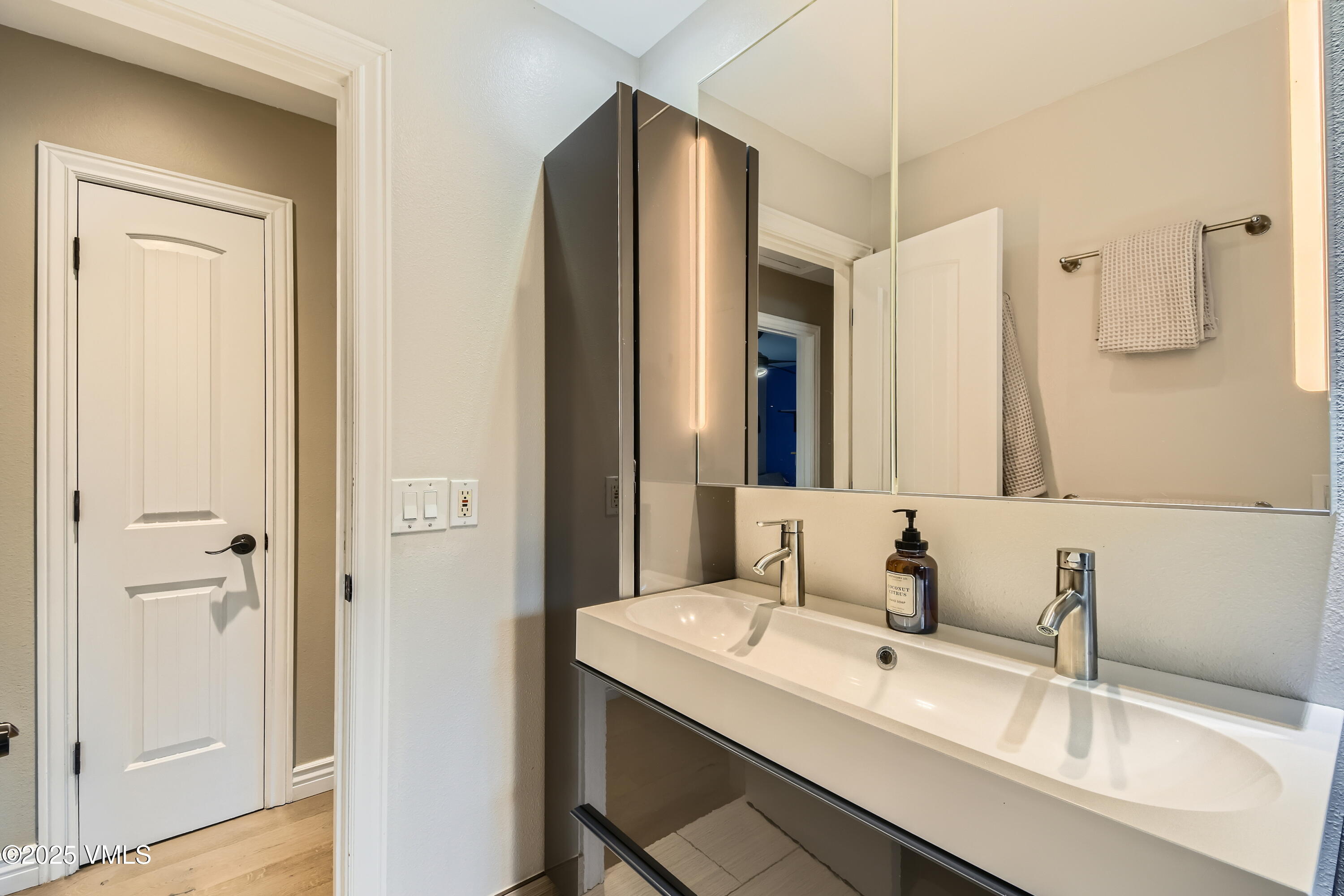 11 Spruce Circle Edwards, CO 81632 - Photo 15 of 27 a bathroom with a granite countertop sink and a mirror