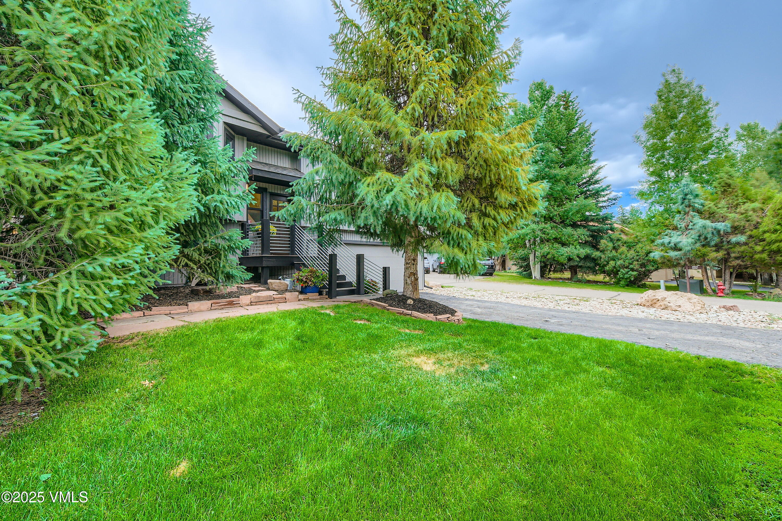 11 Spruce Circle Edwards, CO 81632 - Photo 21 of 27 a view of yard with swimming pool and sitting area