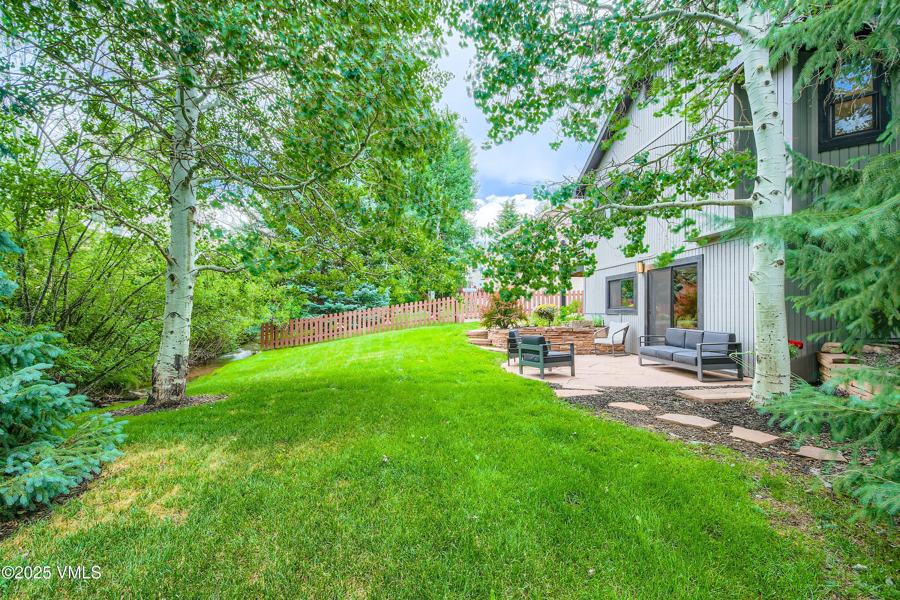 11 Spruce Circle Edwards, CO 81632 - Photo 27 of 27 a view of a backyard with sitting area