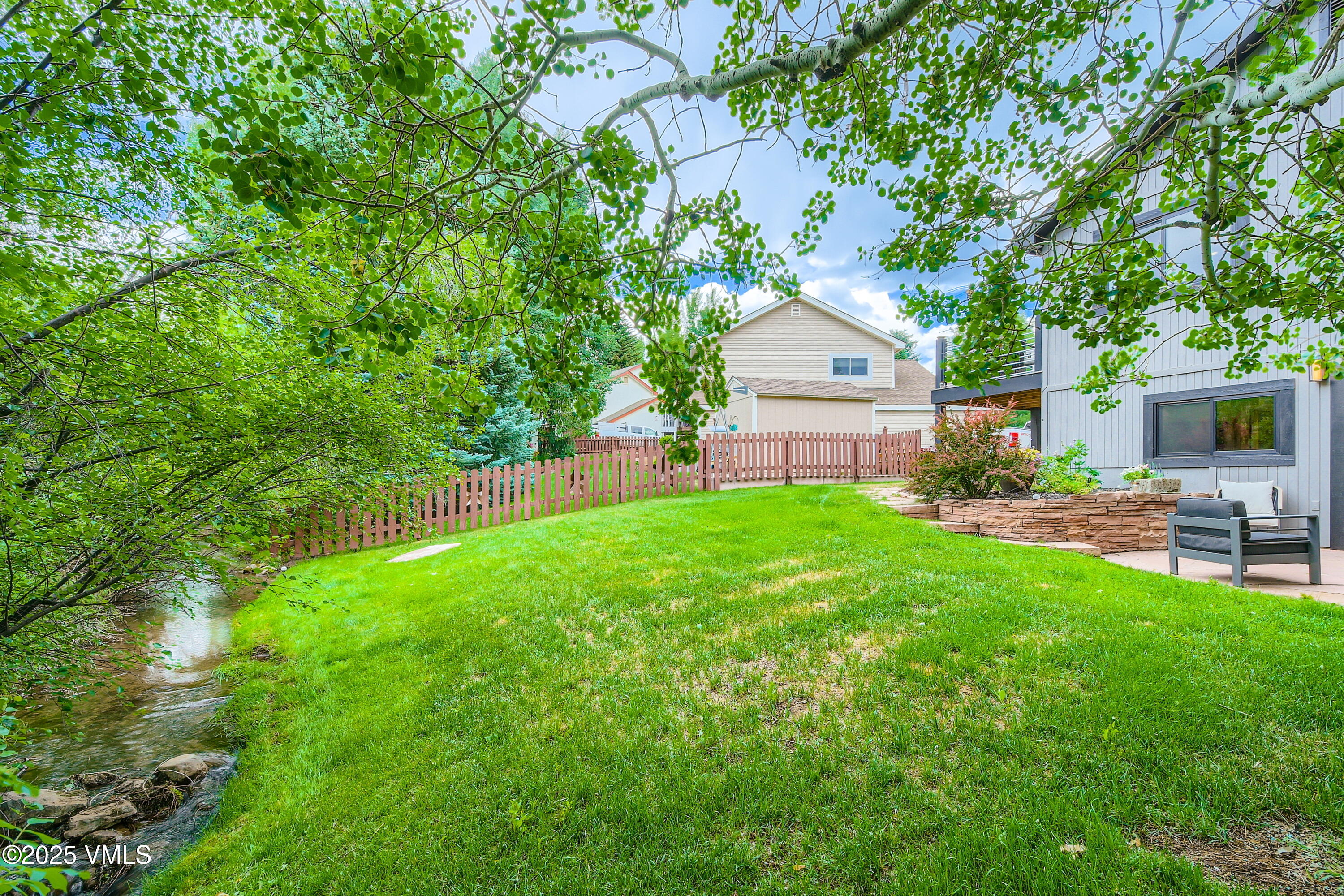 11 Spruce Circle Edwards, CO 81632 - Photo 10 of 27 a view of a house with a back yard