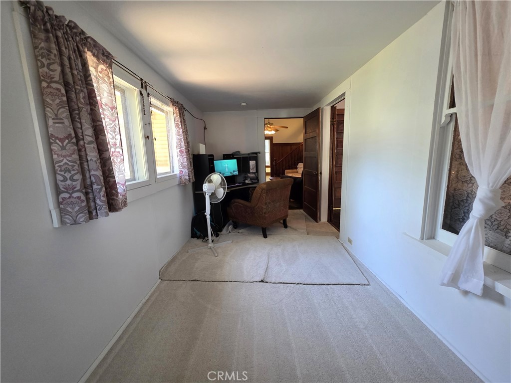 1414 Marin Street Corning, CA 96021 - Photo 11 of 43 a living room with furniture and a window