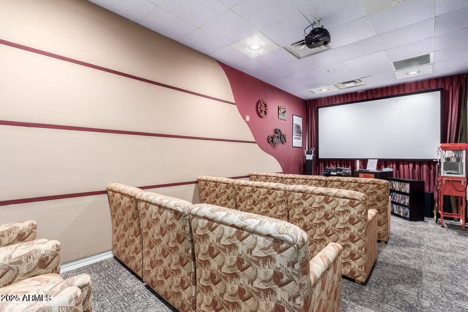 3301 South Goldfield Road, Unit 4027 Apache Junction, AZ 85119 - Photo 38 of 56 Community movie area