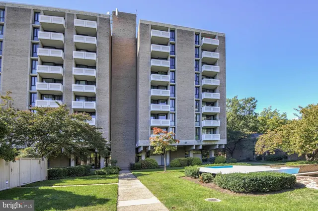 front view of building with a yard