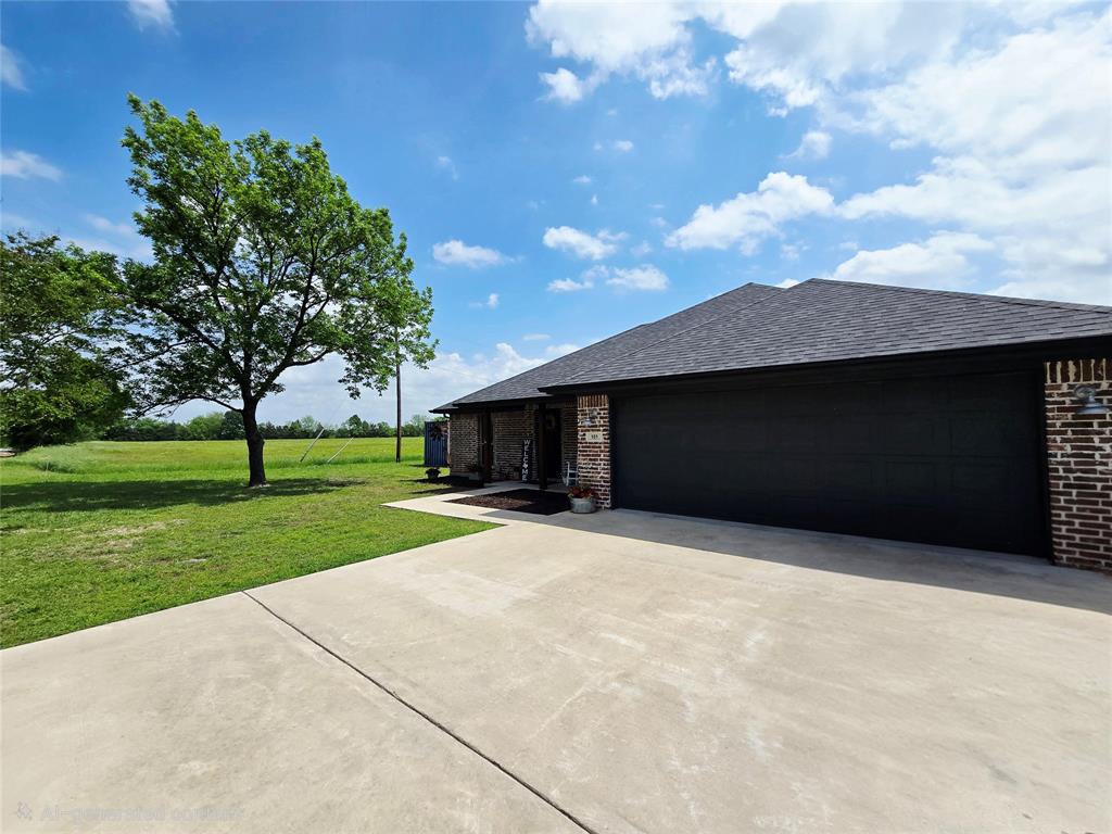101 East Whitewright Road Savoy, TX 75479 - Photo 3 of 19 A garage fit for even an Excursion sized vehicle!