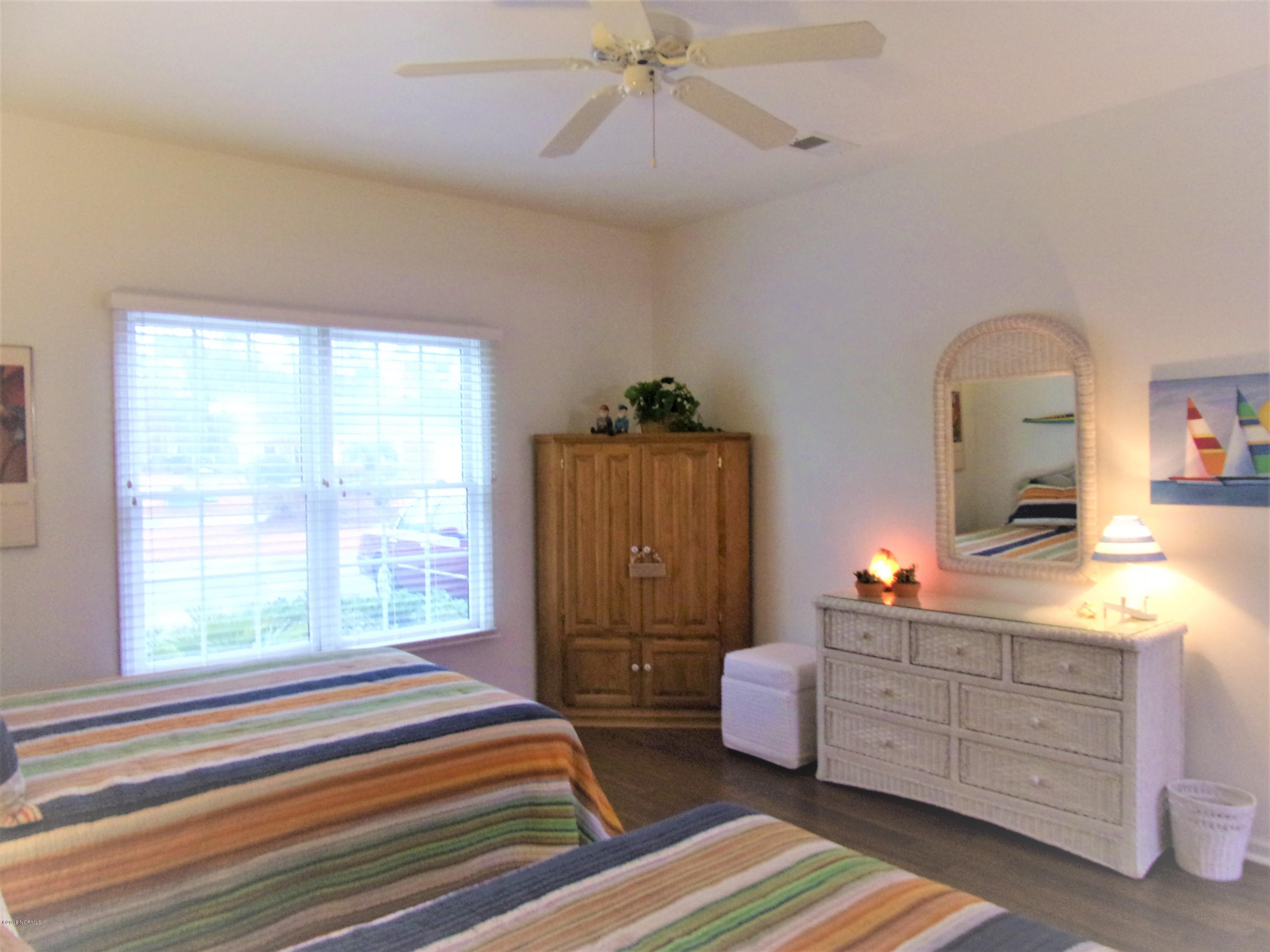 116 Rice Mill Circle, Unit 1 Sunset Beach, NC 28468 - Photo 16 of 24 guest bedroom area