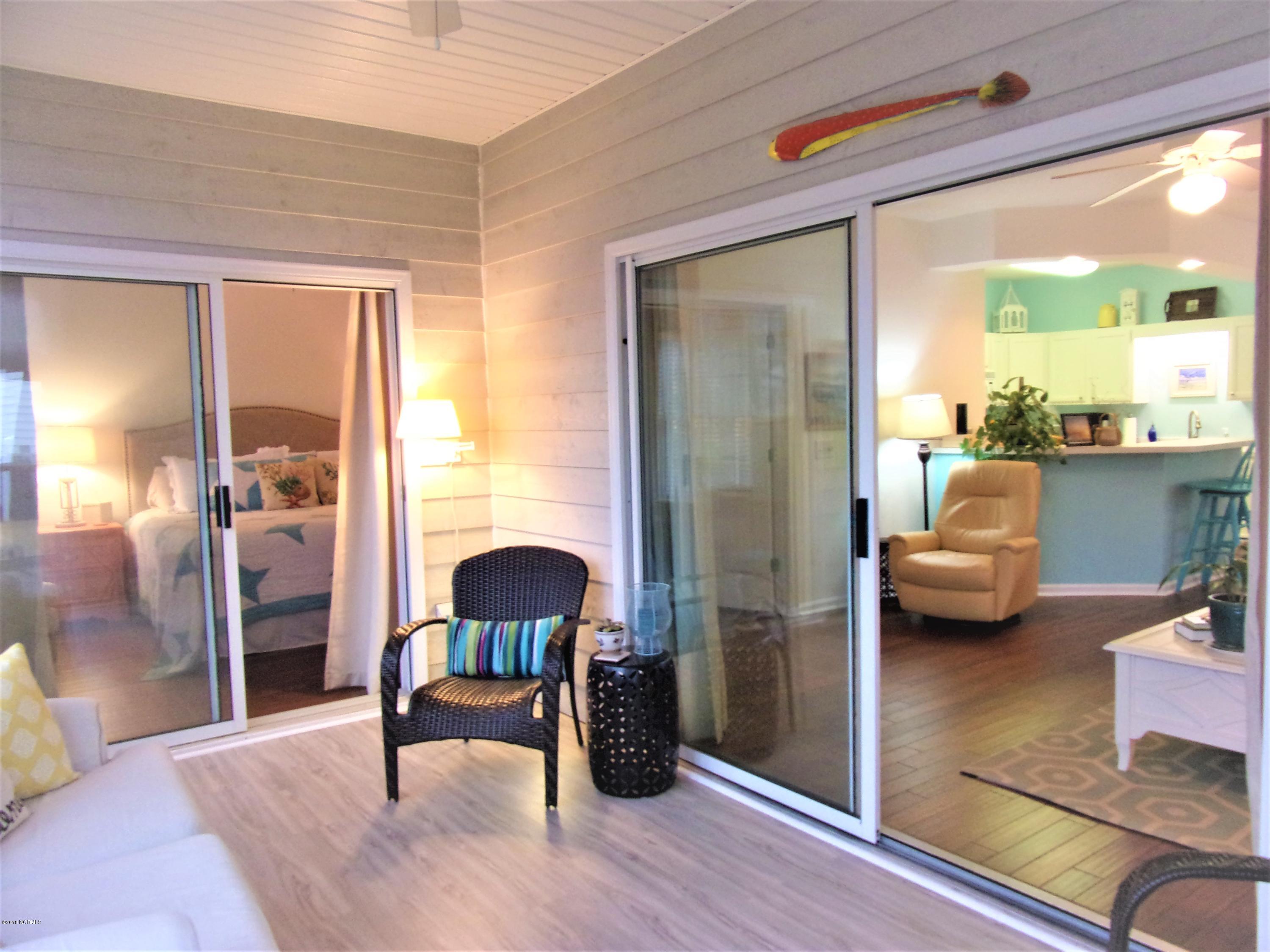 116 Rice Mill Circle, Unit 1 Sunset Beach, NC 28468 - Photo 22 of 24 sunroom entries