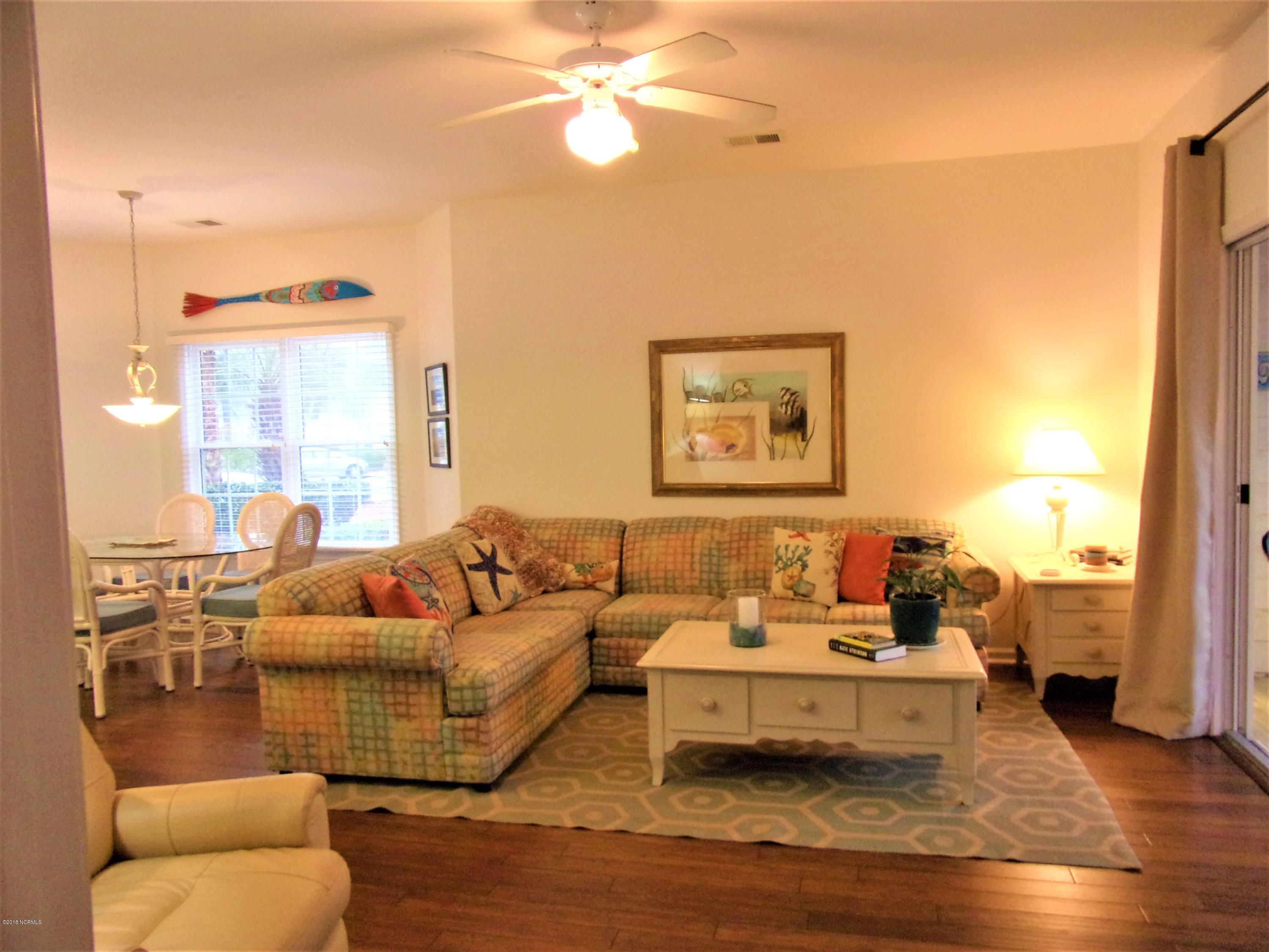 116 Rice Mill Circle, Unit 1 Sunset Beach, NC 28468 - Photo 3 of 24 living room