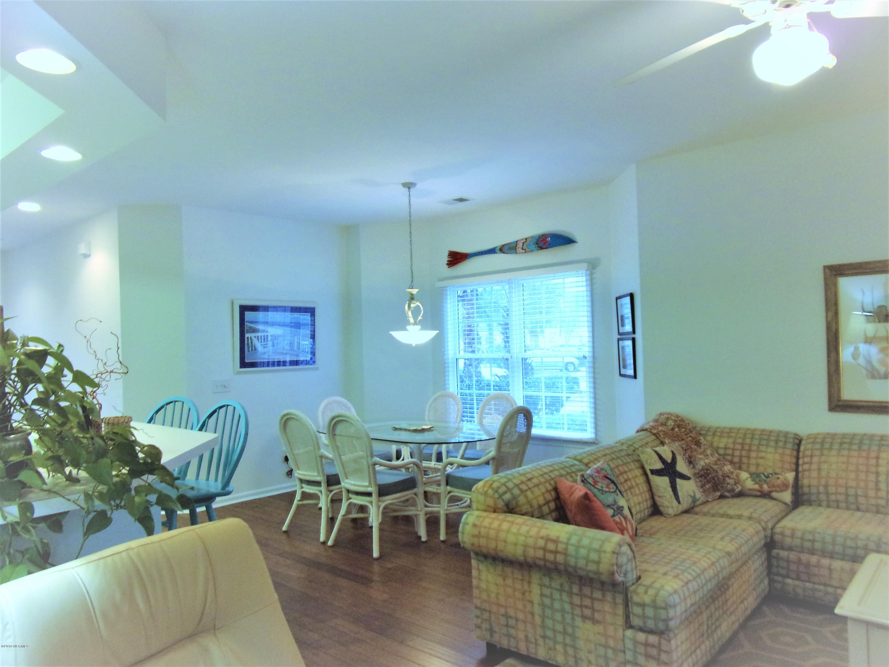 116 Rice Mill Circle, Unit 1 Sunset Beach, NC 28468 - Photo 4 of 24 dining room