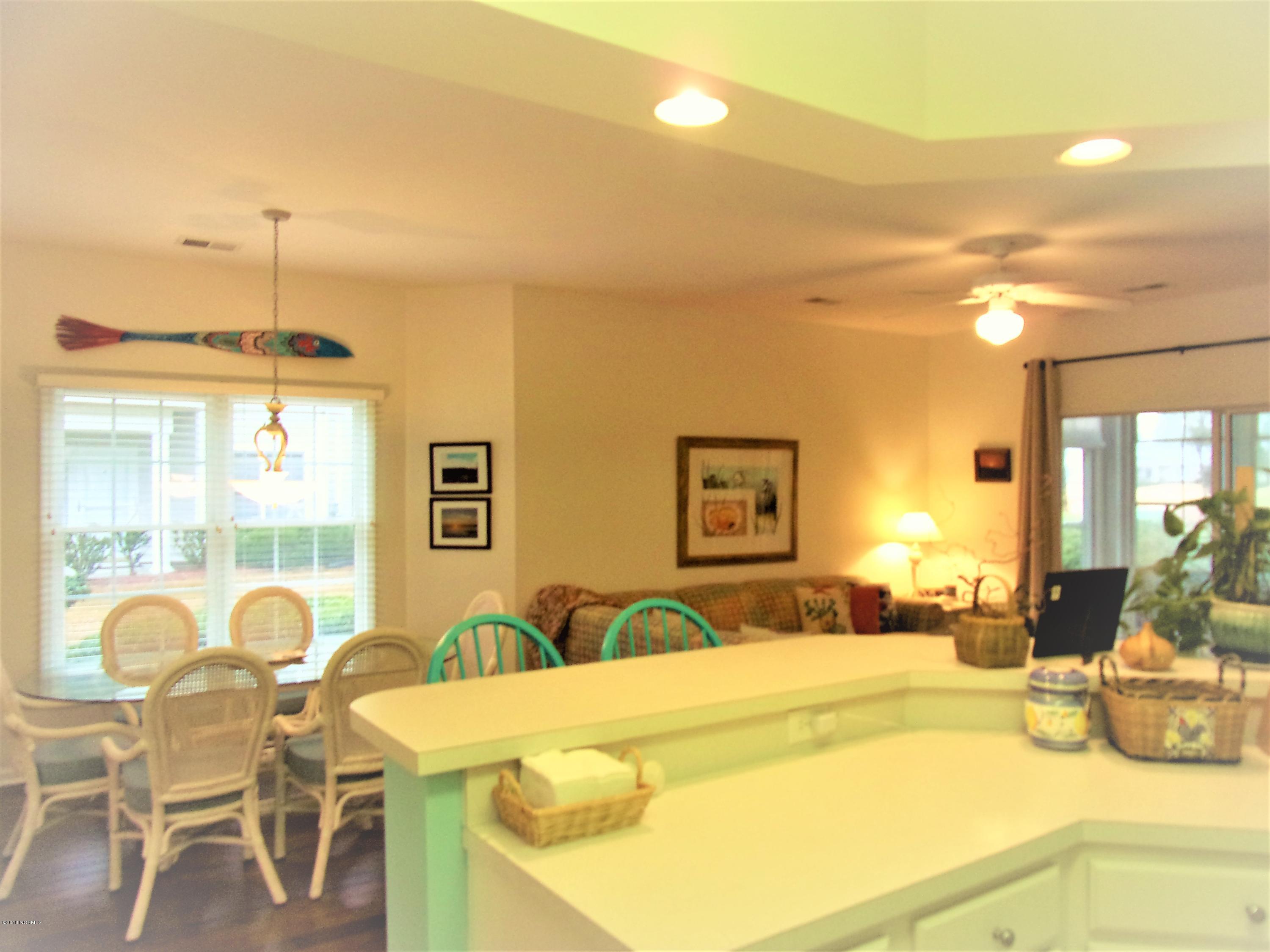 116 Rice Mill Circle, Unit 1 Sunset Beach, NC 28468 - Photo 5 of 24 kitchen bar
