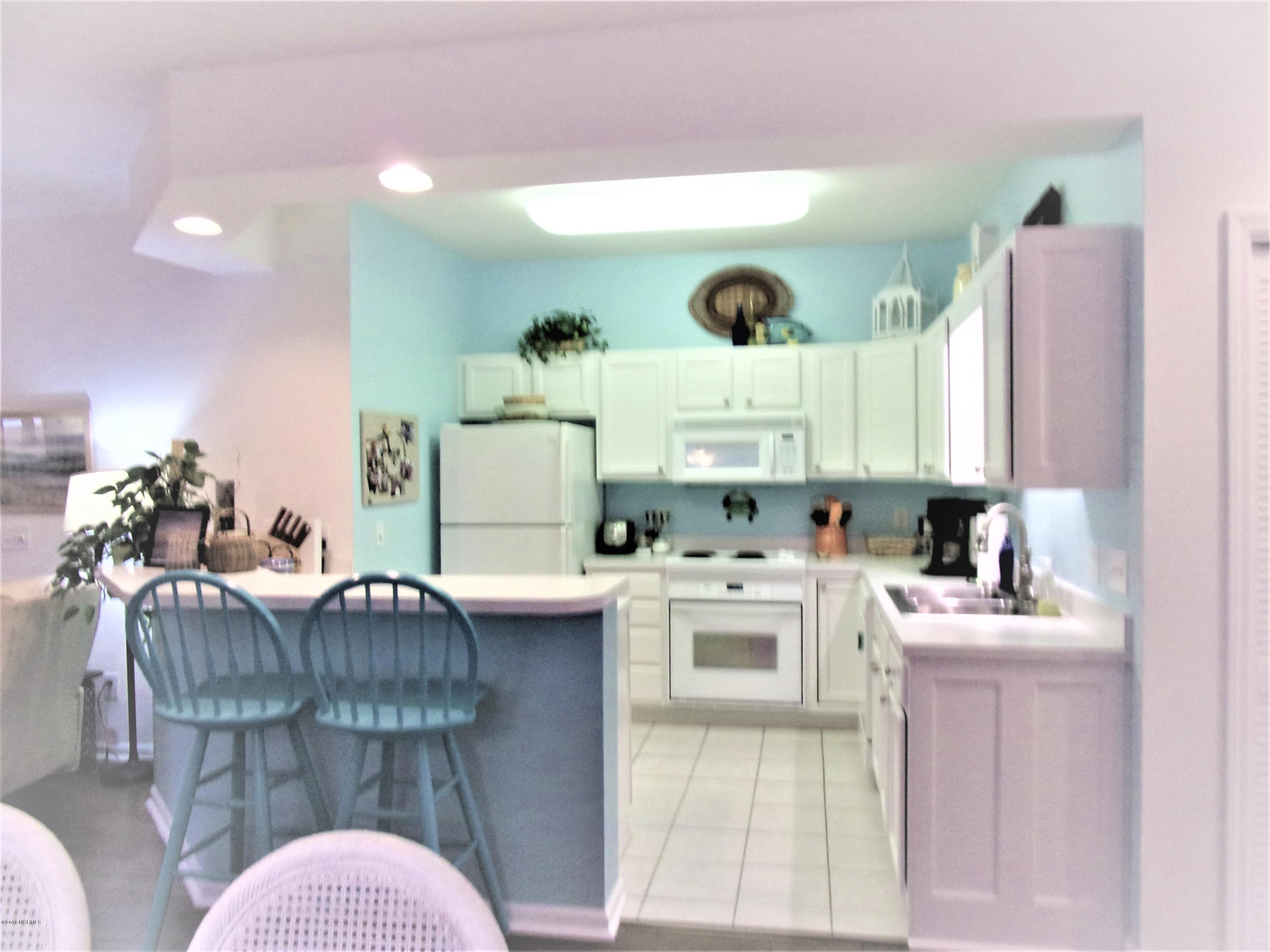 116 Rice Mill Circle, Unit 1 Sunset Beach, NC 28468 - Photo 7 of 24 kitchen area