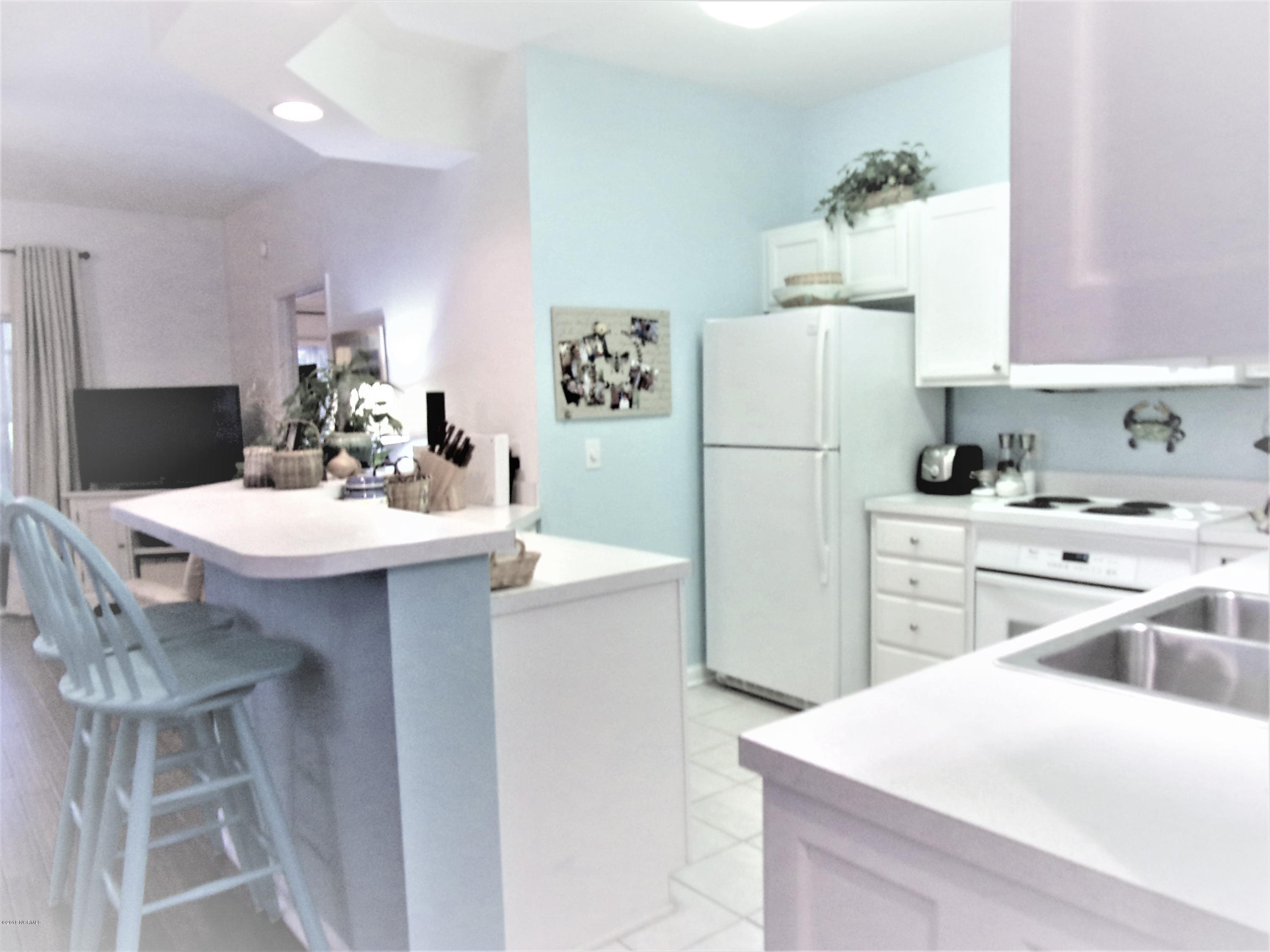 116 Rice Mill Circle, Unit 1 Sunset Beach, NC 28468 - Photo 8 of 24 kitchen