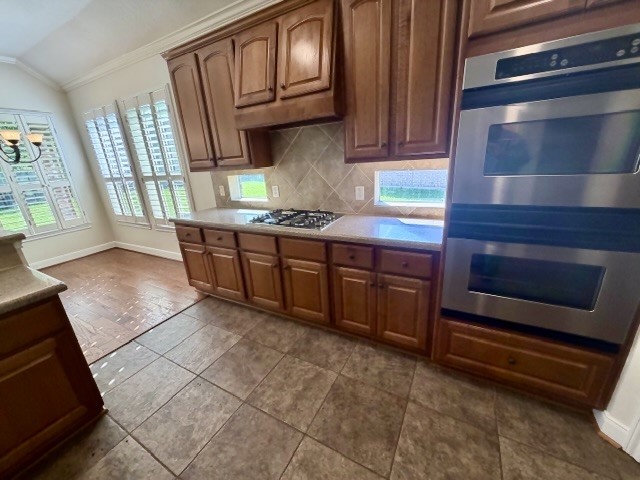 1810 Rippling Water Court Sugar Land, TX 77479 - Photo 12 of 37 Double ovens with the convection oven on top. Beautiful extensive cabinets allow plenty of storage space.