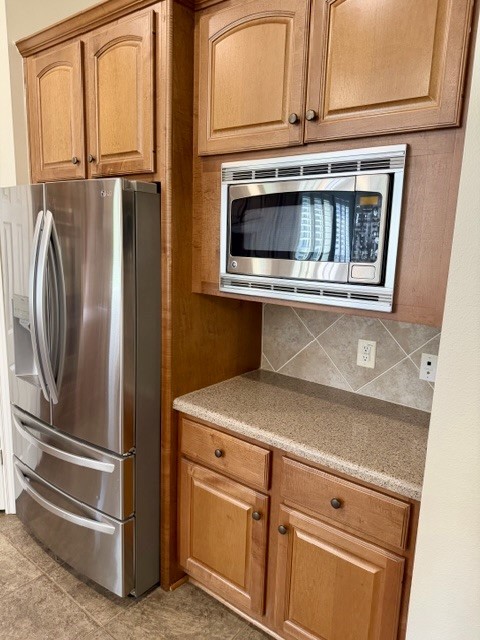 1810 Rippling Water Court Sugar Land, TX 77479 - Photo 14 of 37 Microwave is very handy above countertop.