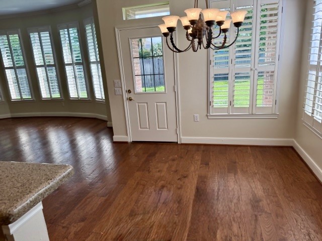 1810 Rippling Water Court Sugar Land, TX 77479 - Photo 17 of 37 Spacious breakfast area with great view of back yard and pretty chandelier.
