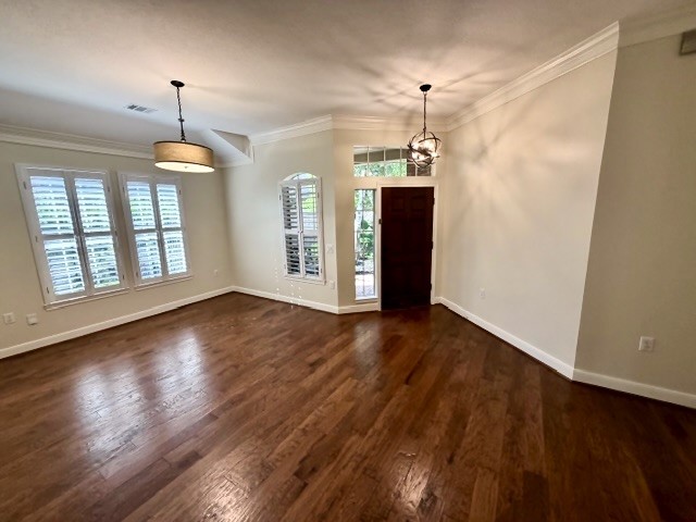 1810 Rippling Water Court Sugar Land, TX 77479 - Photo 2 of 37 The formal dining room is captivating to first appearances as you enter the home. Crown molding in many areas adds a touch of class.