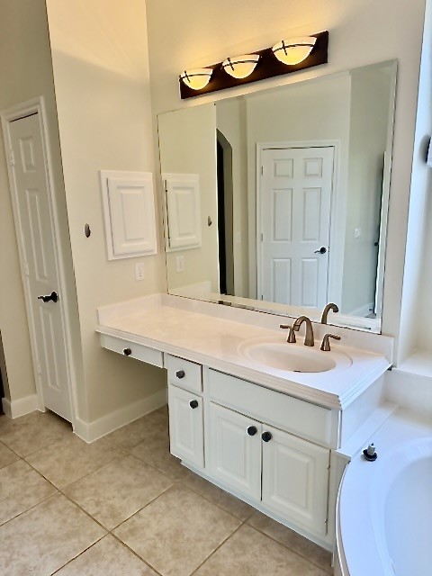 1810 Rippling Water Court Sugar Land, TX 77479 - Photo 25 of 37 A kneehole in the vanity on one side of the primary bath.