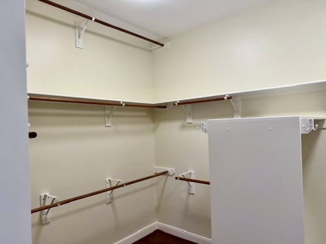 1810 Rippling Water Court Sugar Land, TX 77479 - Photo 28 of 37 Space is well utilized in the primary bedroom closet with additional rods in some areas.