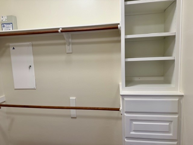 1810 Rippling Water Court Sugar Land, TX 77479 - Photo 29 of 37 Built-in shelves and drawers in primary closet.