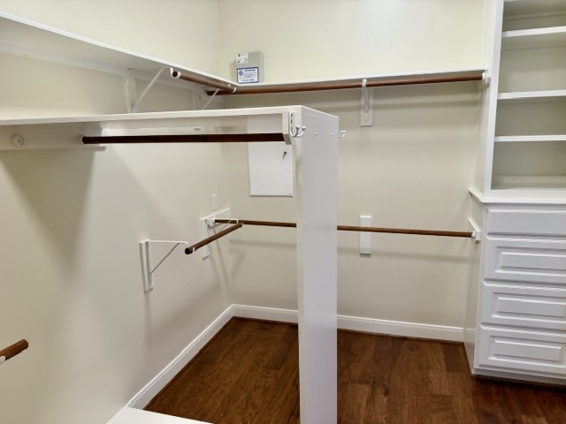 1810 Rippling Water Court Sugar Land, TX 77479 - Photo 30 of 37 Rods for longer clothing can double as a divider in the primary closet.