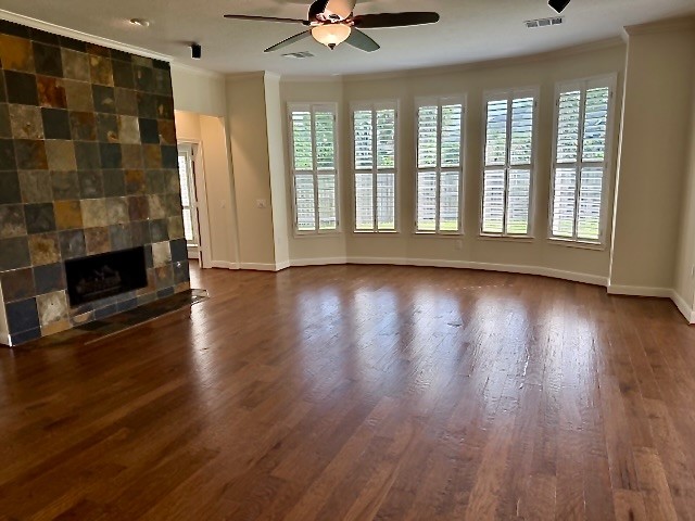 1810 Rippling Water Court Sugar Land, TX 77479 - Photo 5 of 37 Family room has an attractive lighted ceiling fan. Plantation shutters give the room a totally well designed look and are appointed throughout most of the home.
