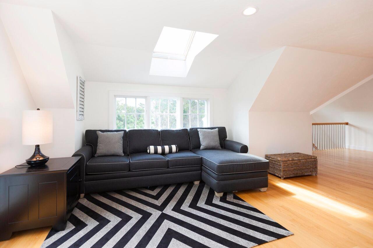 374 Monomoscoy Road Mashpee, MA 02649 - Photo 27 of 29 a living room with furniture