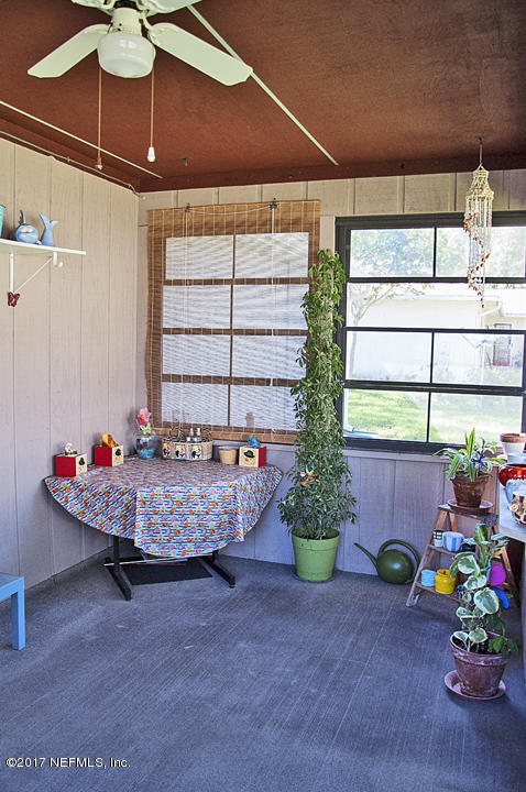 145 Tanager Road St. Augustine, FL 32086 - Photo 29 of 43 a room with furniture and window