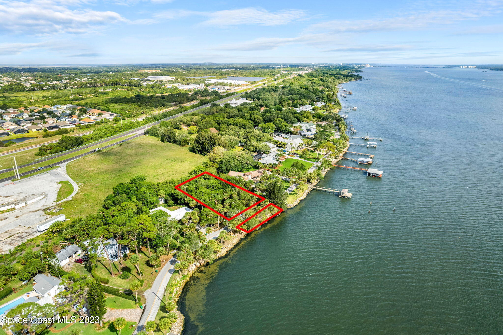 1919 Rockledge Drive Rockledge, FL 32955 - Photo 6 of 10 a view of a lake with a beach