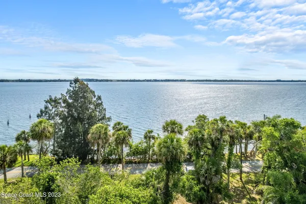 a view of a lake with a garden