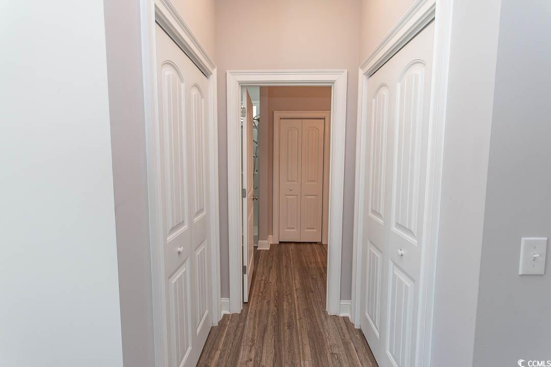 126 Allsbrook Road Loris, SC 29569 - Photo 19 of 30 Hallway with dark wood-style floors
